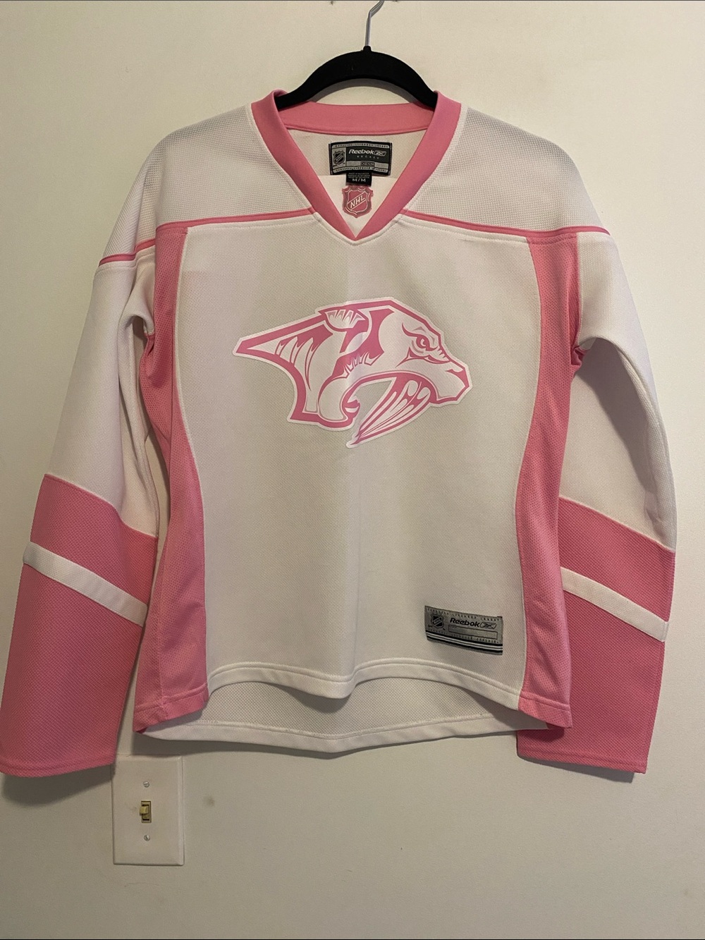 Nashville Predators NHL White and Pink Hockey Jersey . Nice condition